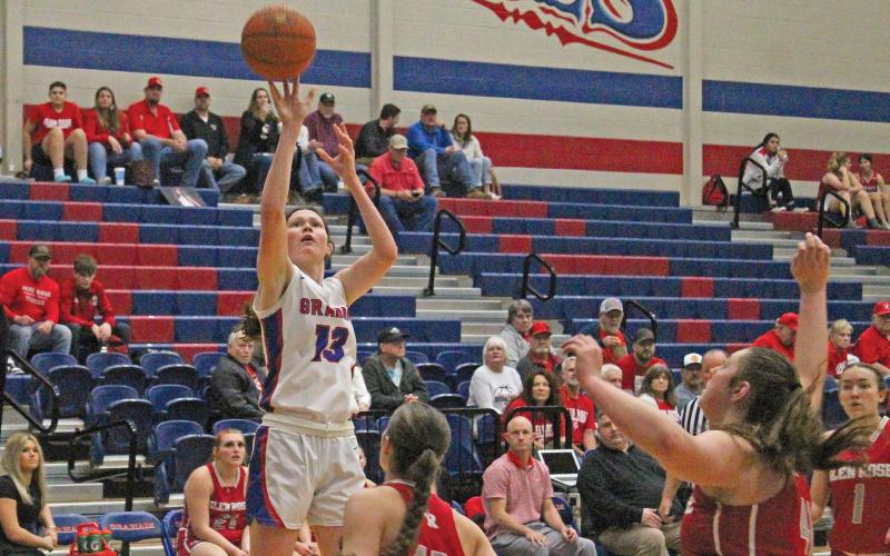 (TC GORDON | THE GRAHAM LEADER) Graham junior Emi Gordy (13) elevates for a shot over Glen Rose defenders during the Lady Blues’ 54-19 loss Friday, Feb. 2 to the Lady Tigers.