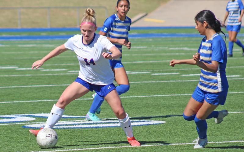 (TC GORDON | THE GRAHAM LEADER) Graham’s Olivia Pettus gains control of the ball and looks to move it upfield during the team’s 2-1 area round playoff loss to San Elizario last Thursday, March 28.