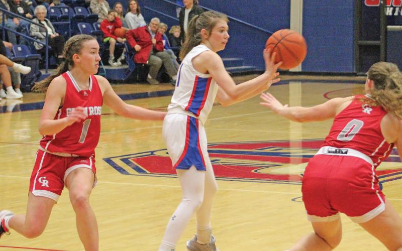 (TC GORDON | THE GRAHAM LEADER) Graham senior Madi Wilde passes to an open teammate during the team’s game Friday, Feb. 2 against Glen Rose. The Lady Blues took a 54-19 loss.