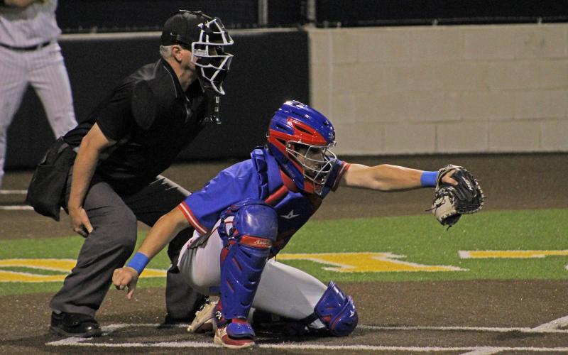 (TC GORDON | THE GRAHAM LEADER) Graham catcher Tripp Mahaney frames a pitch for a strike during the team’s first matchup against Stephenville at the beginning of March. The Steers traveled to Stephenville again Tuesday, March 26 and came away with a 1-0 win over the Yellow Jackets.