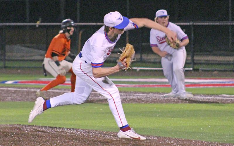 (TC GORDON | THE GRAHAM LEADER) Graham junior Ryder Taylor fires a pitch on the mound to one of Springtown’s hitters during the team’s first game of the season Monday, Feb. 19. The Steers took a 6-2 loss in an error-filled game.