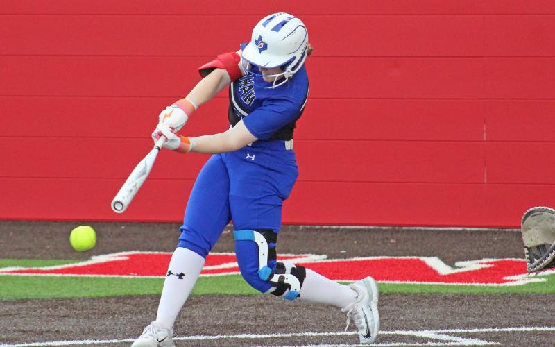 (TC GORDON | THE GRAHAM LEADER) Graham’s Zoey Harrell makes contact with a pitch and follows through for a hit during the team’s rally in their Senior Night 5-3 victory over Glen Rose this past Tuesday, April 16.