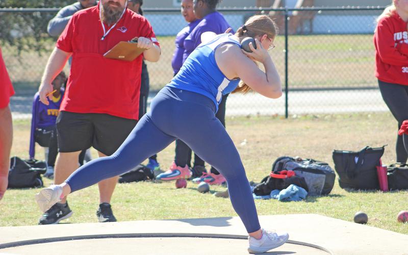 (TC GORDON | THE GRAHAM LEADER) Graham’s Annemarie McHenry gets in motion for one of her shotput attempts during the Ram Relays in Mineral Wells this past Saturday, Feb. 24, the first track and field event of the season.