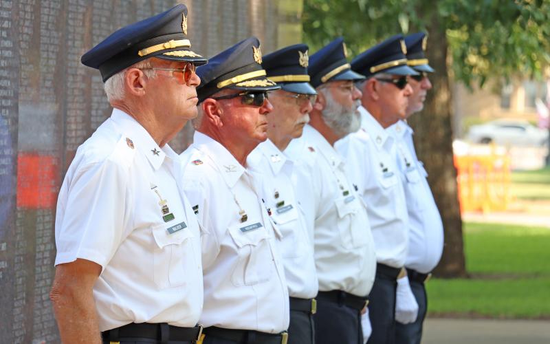 (ARCHIVE PHOTO | THE GRAHAM LEADER) Veterans with the American Volunteer Reserve stand at attention during a ceremony held in honor of veterans at the Celebrate Freedom event in 2024.