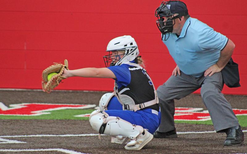(TC GORDON | THE GRAHAM LEADER) Senior catcher Meagan Brooks catches a pitch behind the plate for a strike during Graham’s 5-3 Senior Night win over Glen Rose.