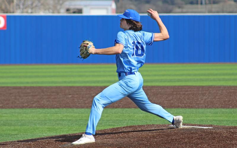 (TC GORDON | THE GRAHAM LEADER) Graham junior Bruin Wright extends and fires a pitch from the mound during one of the team’s games earlier this season. The Steers competed in the ACS tournament over the weekend of Feb. 29-March 1 and came back with a 3-1 record in four games.