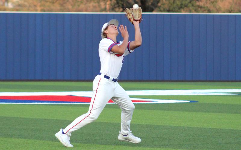 (TC GORDON | THE GRAHAM LEADER) Graham junior Harison Brockway catches a pop fly at shortstop for an out during one of the team’s earlier games this season. The Steers played a close game but ultimately took a 4-3 loss to Stephenville last Thursday, March 28.