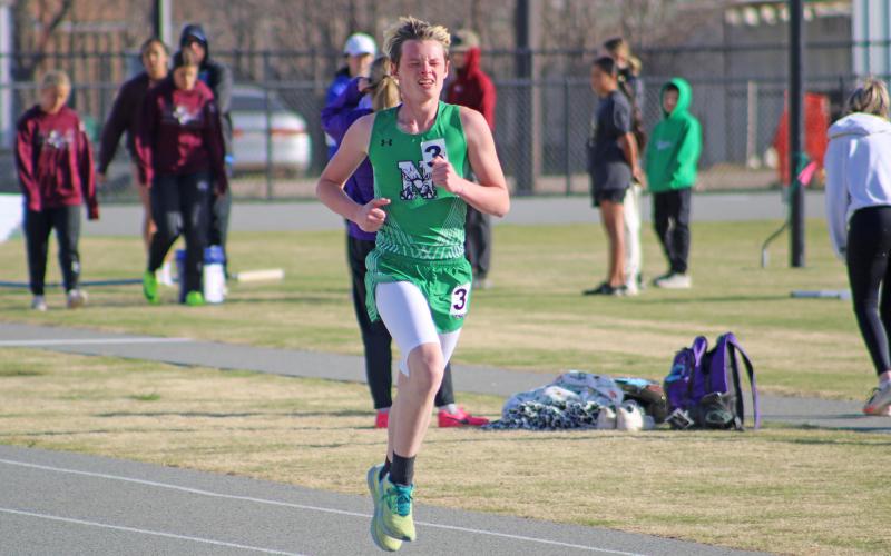 (ALEX HAVARDANSKY | THE GRAHAM LEADER) Leighton Gowens participates in the 3200m run to start the day at the Newcastle Relays. 