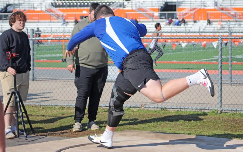 (TC GORDON | THE GRAHAM LEADER) Graham’s Pavlo Prenushi begins his motion for the shot put during one of the team’s track and field meets earlier this season. The Steers and Lady Blues recently competed at the Col Mobley Optimist Relays in Stephenville last Thursday, March 28.