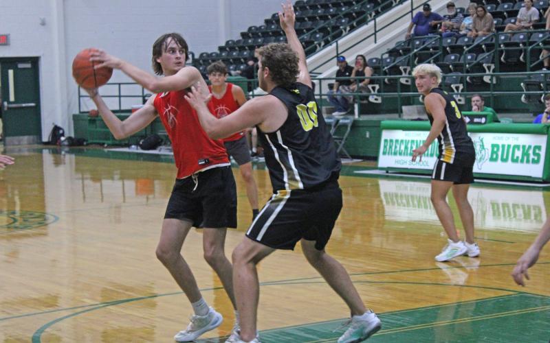 (ALEX HAVARDANSKY | THE GRAHAM LEADER) Nick Wankowicz looks for an open man in the paint Tuesday, June 17, against the Cisco Loboes. The Steers will be competing in a fall league hosted in Graham starting Monday, Sept. 22.