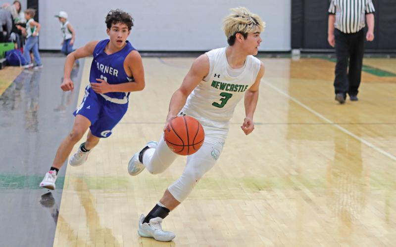 (THOMAS WALLNER | THE GRAHAM LEADER) Keyton Newland makes his presence known on the court with swift footwork and the scoring to match for the Newcastle Bobcats. Newland’s talents were on display this week in their match against Garner where he led in shooting with 18 points while also making crucial plays across the court.