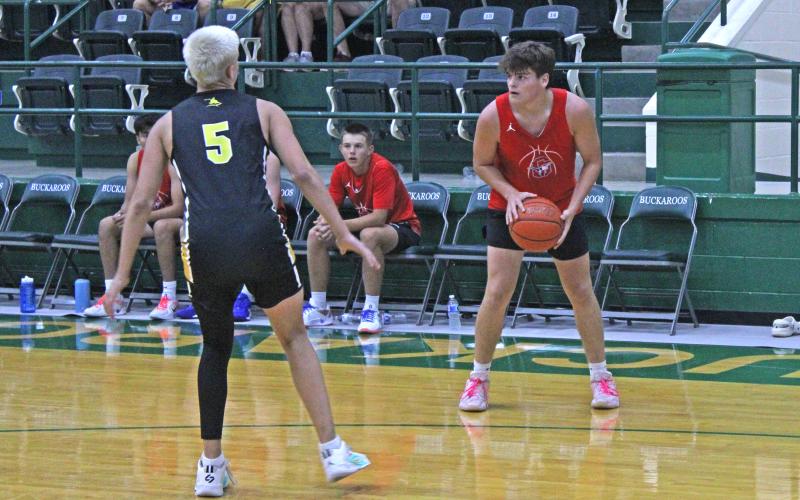 (ALEX HAVARDANSKY | THE GRAHAM LEADER) Bryce Martin stands in the corner looking to pass Tuesday, June 17 against the Cisco Loboes. The Martin brothers have provided a steady stream of offense all summer.
