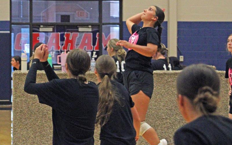 (ALEX HAVARDANSKY | THE GRAHAM LEADER) Newcastle attempts a kill on the right side of the net Monday, June 23. The Ladycats picked up wins in both their matches.