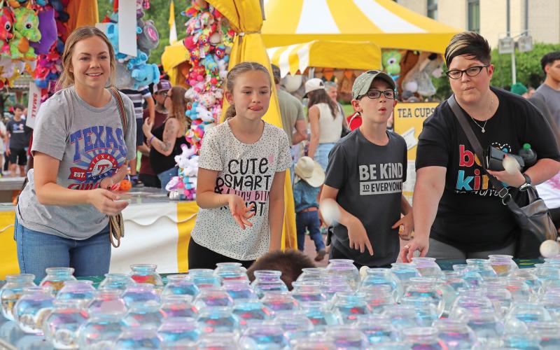 (ARCHIVE PHOTO | THE GRAHAM LEADER) Games, rides, food and more will be available at the Graham Lions Club Carnival that will head downtown May 7-10. Some of the food selections include German sausage, corn dogs and funnel cakes.