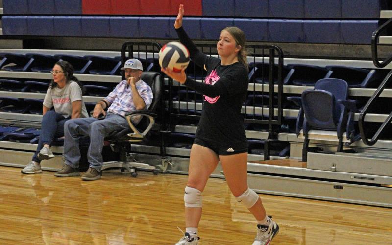(ALEX HAVARDANSKY | THE GRAHAM LEADER) Ruby Shaffer lines up for a serve Monday, June 23. The Lady Blues second team picked up multiple points in a win with Shaffer at the service line.