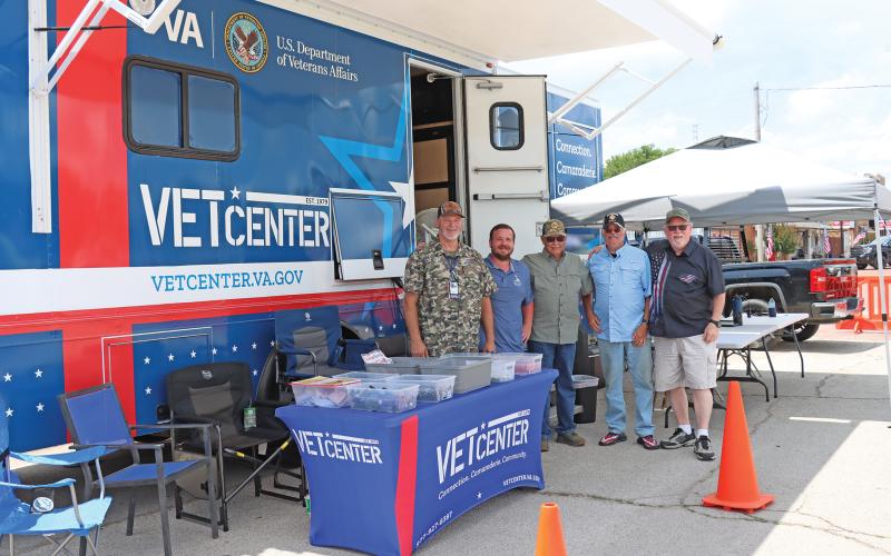 (THOMAS WALLNER | THE GRAHAM LEADER) The Mobile Vet Center from Abilene which offers free mental health services tailored to rural veterans. Shown from left to right are John Draper, Adam LaVine, David Gann, Dan Ferris and Tony Lipscomb. 