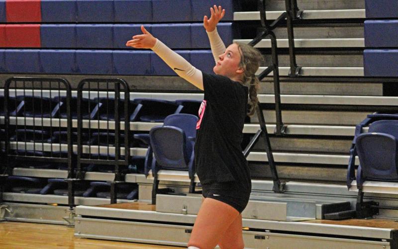 (ALEX HAVARDANSKY | THE GRAHAM LEADER) Hannah Hill attempts a serve Monday, June 23. Hill has been an all around complete player offensively and defensively for the Lady Blues.