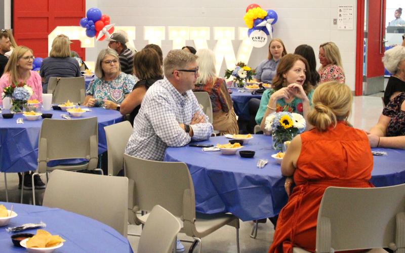 (ALEX HAVARDANKSY | THE GRAHAM LEADER) Audience members eat during the kickoff event Thursday, Sept. 18 for Graham Area United Way at North Central Texas College. The organization is 47% of the way to meeting their goal of $100,000.