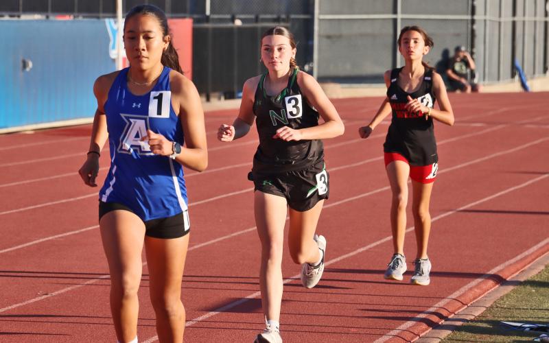 (THOMAS WALLNER | THE GRAHAM LEADER) Greenleigh Moore runs Saturday, March 21 in the 3200-Meter Run at the PK Relays in Graham. 