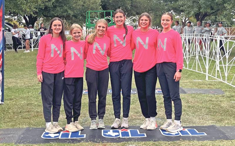 (CONRTRIBUTED PHOTO) The Newcastle Ladycats cross country team the day before their race in the state meet which was held Nov. 2, 2024. The Ladycats came in 11th place as a team, led by senior Mattie Dollar who finished 33rd overall.