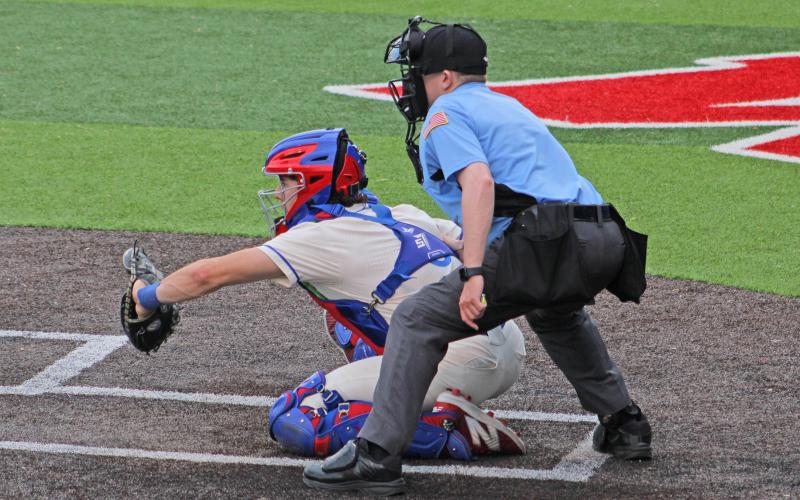 (ALEX HAVARDANSKY | THE GRAHAM LEADER) Tripp Mahaney behind the dish Thursday, April 17, for the Steers. Mahaney was awarded first team all state honors at catcher for his efforts this season.