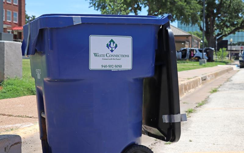(THOMAS WALLNER | THE GRAHAM LEADER) A polycart trash can from Waste Connections used by residents in Graham. New polycarts by KC Dumpsters will be delivered to existing customers during the week of Monday, Aug. 18 through Sunday, Aug. 31. 