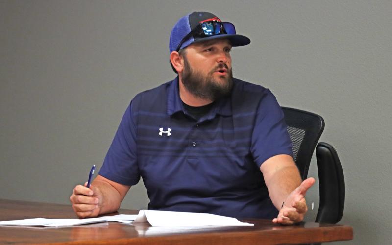 (THOMAS WALLNER | THE GRAHAM LEADER) Public Works Director Randall Dawson speaks to the Graham Planning and Zoning Commission in June during a public hearing held for a rezoning of an Indiana Street lot from Local Retail to Townhouse.
