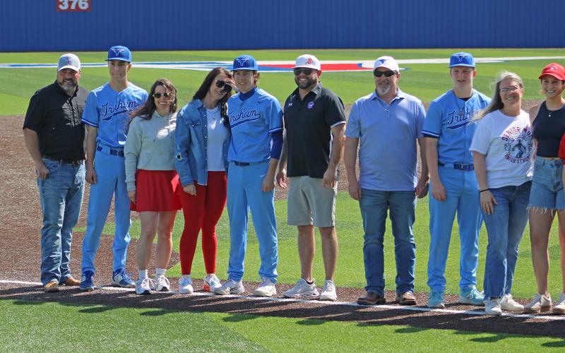 (ALEX HAVARDANSKY | THE GRAHAM LEADER) Levi Jilek, Kason Martin and Mason Milton honored with their families at senior day.