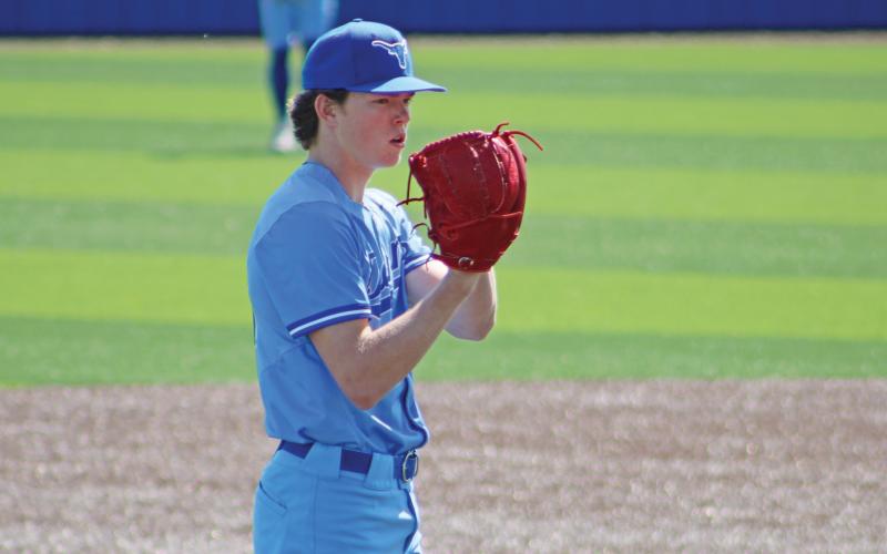 (ALEX HAVARDANSKY | THE GRAHAM LEADER) Ryder Taylor takes the mound in the top of the first for the Steers. The Steers beat the Iowa Parks Hawks in their senior day game held Saturday, March 22.