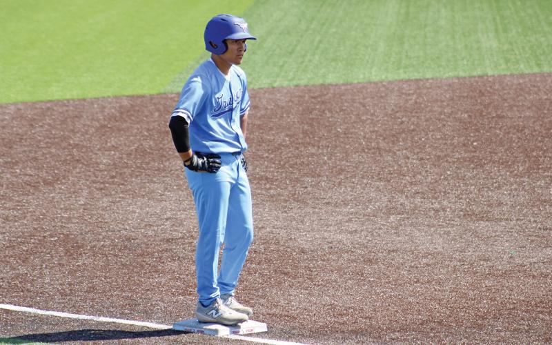 (ALEX HAVARDANSKY | THE GRAHAM LEADER) Mike Garcia stands ready at third base for any potential scoring opportunity after knocking in an RBI double for his the Steers during the Saturday March, 22 matchup. Garcia would go on to steal home plate after a wild pitch making it a 2-0 Graham lead. 