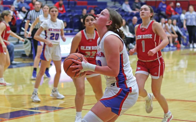 (THOMAS WALLNER | THE GRAHAM LEADER) Addyson Weaver of the Lady Blues lines up a shot at the basket during a game Tuesday, Jan. 21 against Glen Rose. The team had a third-quarter pushback, but it was not enough to push the team to victory.