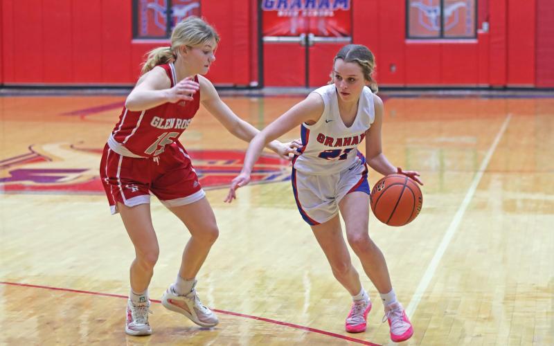 (THOMAS WALLNER | THE GRAHAM LEADER) Bentleigh Martin moves past a Glen Rose defender during the game Tuesday, Jan. 21 which resulted in a 35-57 loss for the Lady Blues. After traveling Friday, Jan. 24 to Stephenville, the team will return home Tuesday, Jan. 28 for a matchup against Brock.