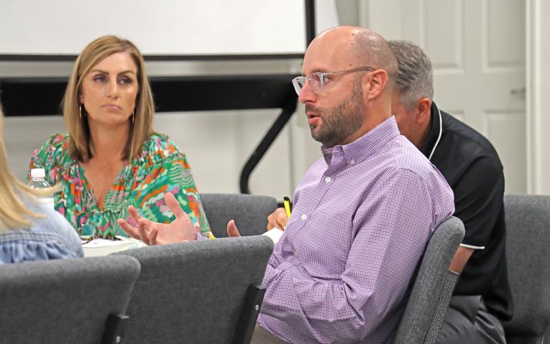 (THOMAS WALLNER | THE GRAHAM LEADER) Graham ISD Board of Trustees President Chris Blanton speaks with representatives from Impact Education Specialists which were hired by the district to search for a new superintendent. The representatives met with the school board in a special meeting held Thursday, Aug. 1.