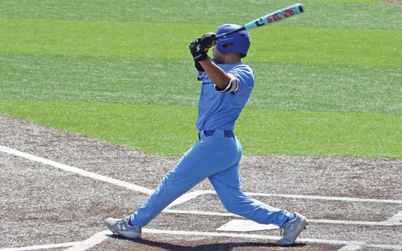 (ALEX HAVARDANSKY | THE GRAHAM LEADER) Mike Garcia taking a swing at the plate for the Steers during the senior day held Saturday, March 22 against the Iowa Park Hawks. The Steers came away with a 8-7 victory.