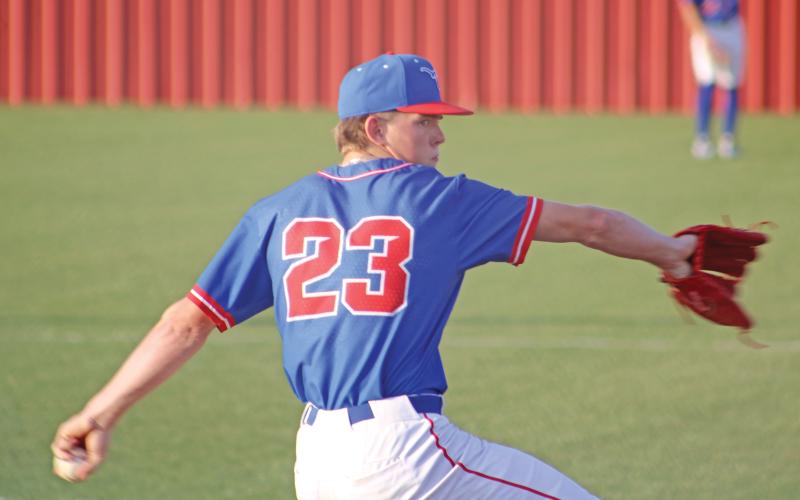(ALEX HAVARDANSKY | THE GRAHAM LEADER) Ryder Taylor up on the mound in the bottom of the first Tuesday, April 22 against the Glen Rose Tigers. Taylor proved to be a major impact on the Steers win both on the mound and behind the plate offensively.