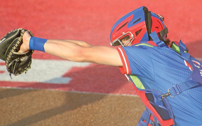 (ALEX HAVARDANSKY | THE GRAHAM LEADER) Tripp Mahaney behind the dish at catcher Tuesday, April 22 against the Glen Rose Tigers. Head coach Allen McGee praised Mahaney and Ryder Taylor’s relationship as part of why they are such a dynamic duo.
