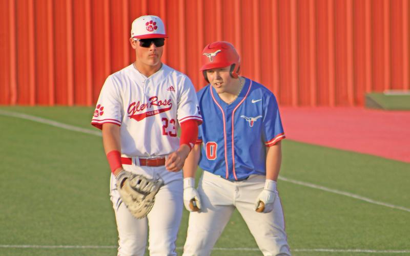 (ALEX HARVARDANSKY | THE GRAHAM LEADER) Colter Johnson attempts to steal second base Tuesday, April 22 against the Glen Rose Tigers. Johnson was an important piece on the base paths Friday, April 25 after being a key runner scored in the contest. 