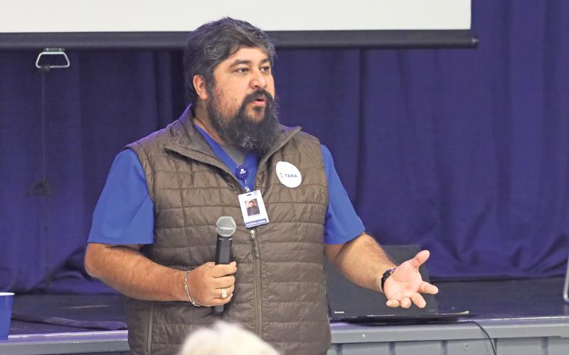 (TC GORDON | THE GRAHAM LEADER) Enoc Espinoza shares information at a meeting Monday, Nov. 18 about why the TARA project is a benefit to Young County. This new website has information for various organizations and agencies in the community that people can find.