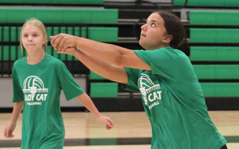 (ALEX HAVARDANSKY | THE GRAHAM LEADER) Emma Hawkins works on setting a Ladycats volleyball camp Tuesday, July 29. Hawkins will be one of the returning veteran leaders for Newcastle this year.