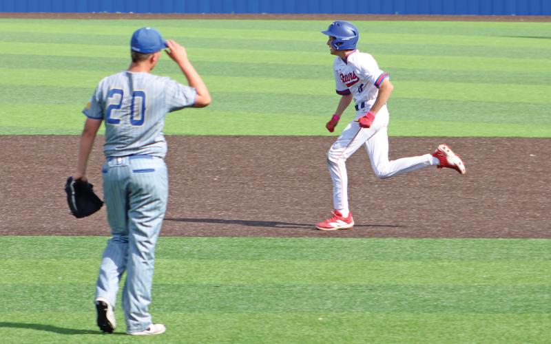(ALEX HAVARDANSKY | THE GRAHAM LEADER) Baserunning would be a key characteristic of Graham’s early advantage in their matchup against the Brock Eagles on Friday, March 28. 