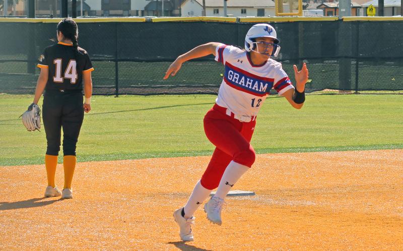 (MIKE WILLIAMS | CONTRIBUTED PHOTO) Graham’s Olga Morales rounds second and heads for third base during one of the team’s games in the Abilene tournament over the past weekend.