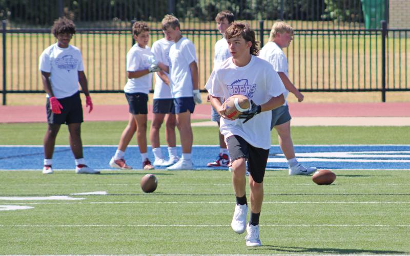(ALEX HAVARDANSKY | THE GRAHAM LEADER) The older session of Steers football camp participated in the best hands drill Wednesday, July 30. McChristian described this camp as a fun way to compete without regular season pressures. 