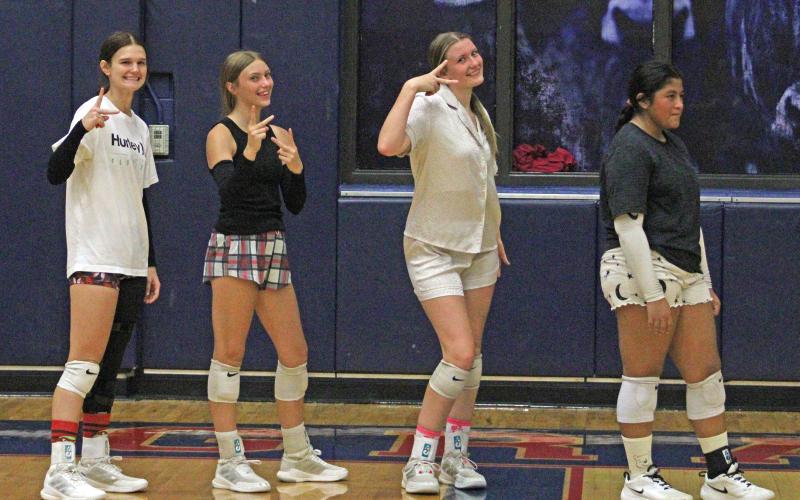 (ALEX HAVARDANSKY | THE GRAHAM LEADER) Members of the Lady Blues pose during drills Friday, Aug. 1. The Lady Blues kicked off their two-a-day schedule with a midnight madness practice.