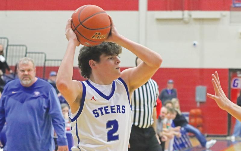 (LIAM BAILEY | THE GRAHAM LEADER) Bryce Martin looks for an open teammate Tuesday, Jan. 28 and a way to break Brock’s tough defense. The Steers fought hard in the rematch, but the outcome was the same with the game ending in a 38-59 loss for Graham.