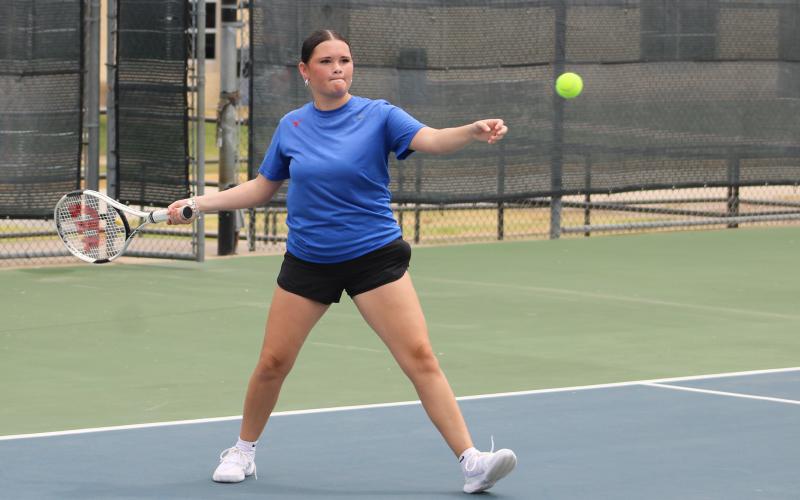 (ALEX HAVARDANSKY | THE GRAHAM LEADER) Hope Jones takes a swing at a ball Friday, Aug. 1. Jones and her teammate Jade Dospapas had formed a solid group in the girls doubles ranks. 