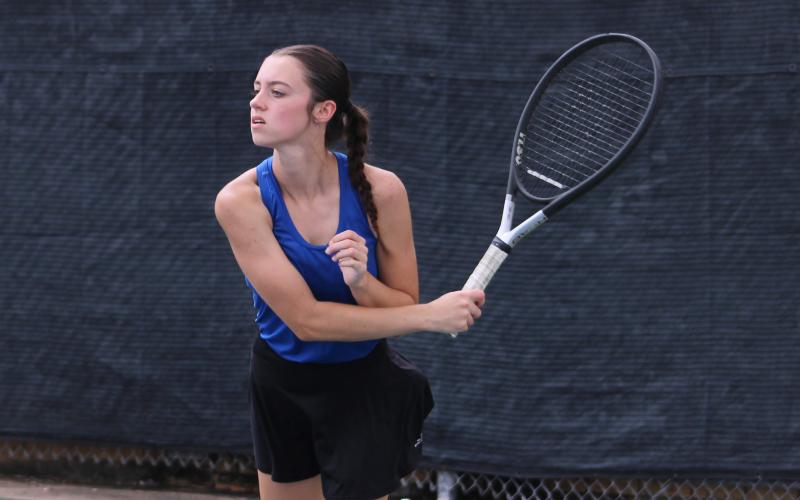 (ALEX HAVARDANSKY | THE GRAHAM LEADER) Olivia Buckley at the service line Friday, Aug. 1. Buckley proved to be a steadying force for Graham’s mixed doubles team in their day two win.
