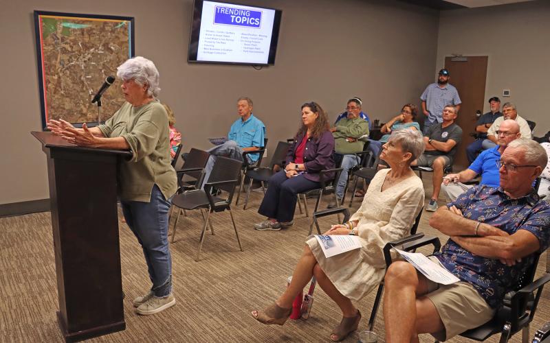 (THOMAS WALLNER | THE GRAHAM LEADER) Graham resident Carol Willis pleads with the Graham City Council to consider those on a fixed income when considering raising the property tax rate. Willis spoke on a number of issues with the city during a town hall meeting Tuesday, Aug. 26.