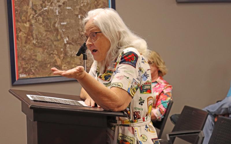 (THOMAS WALLNER | THE GRAHAM LEADER) Graham resident Susie Cerecedez voices concerns to the Graham City Council and city staff regarding the poverty level in Graham. Cerecedez was one of four speakers from the public at a town hall meeting hosted Tuesday, Aug. 26.