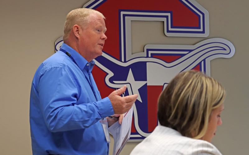 (THOMAS WALLNER | THE GRAHAM LEADER) Graham ISD Chief Financial Officer Gary Browning speaks Wednesday, Aug. 27 with the GISD Board of Trustees regarding the upcoming fiscal year budget for the district.
