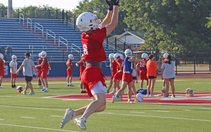 (ALEX HAVARDANSKY | THE GRAHAM LEADER) A Steers receiver goes up for a ball in passing drills Tuesday, Aug. 5. Head coach Clay McChristian said the level of preparation for the season with Graham athletes is something he’s always pleased with.